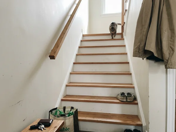 Same straight staircase after renovation with oak treads