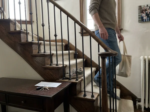Kingsway curved oak staircase with iron balusters, 6-week scope, $28,000