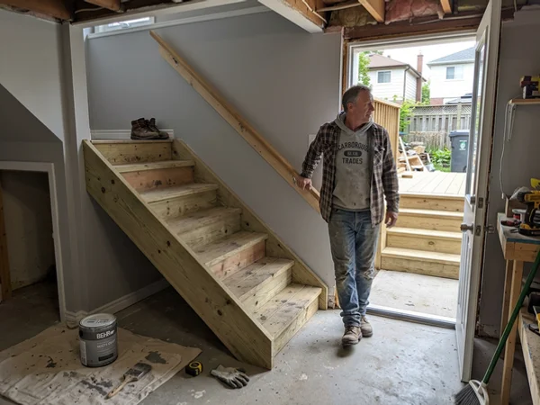 Scarborough basement stair rebuild with pressure-treated exterior steps, $7,200